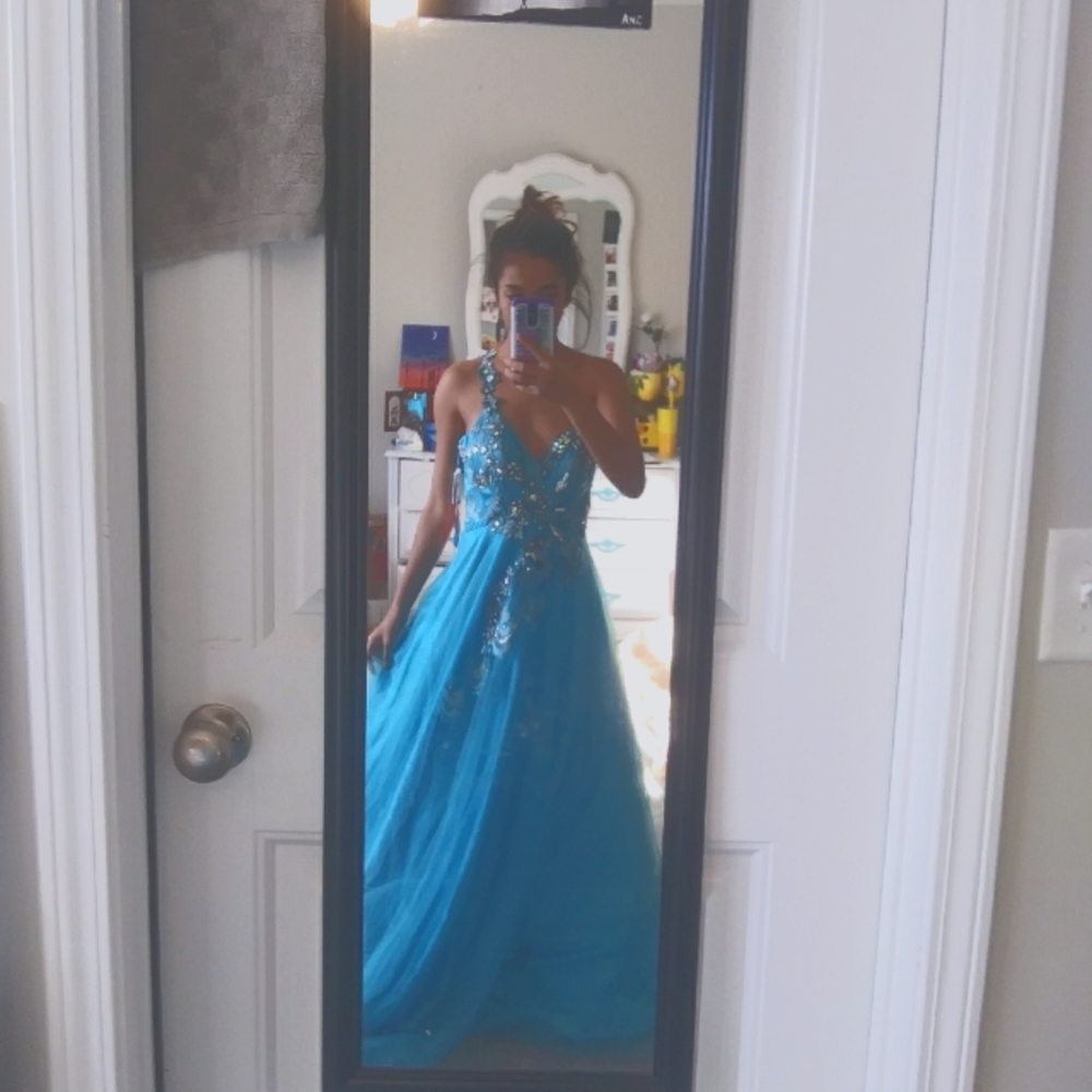 Beautiful formal gown with the original tags.